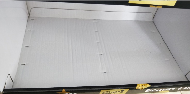 Holidaypac archive close-up of cardboard display base fastenings on a pallet